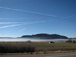 Jet Airplane Contrail above Mancos Valley, Colorado by Roger J. Wendell 03-17-2007