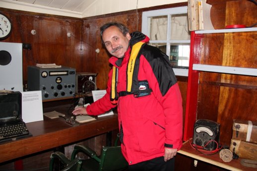 Roger J. wendell and a hand key a the Port Lockroy museum, Antarctica - 01-30-2011