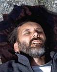 Roger Wendell Laying in the Road With a Head Injury - Tien-Shan Mountains, Xinjian Province, China - 2001