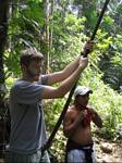 Graham swings from a Rainforest vine - Ecuador, January 2006