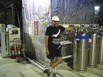 Your Humble Webmaster Leans on Some Stainless Steel Stuff at KamLAND - Japan, May 2004