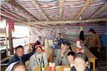 Uyghur Lunch Crowd in the Country - Xinjian Province, China - 2001