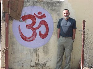 Roger J. Wendell with the mystical and sacred symbol Aum in India